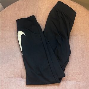 Nike Kids Black Sweatpants with White Swoosh